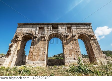 The Symbol Of Ancient Patara (lycia) City - Arch Of Mettius Modestus, Mediterranean Coast Of Turkey.