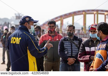 Haridwar, Uttarakhand India April 06, 2021. Policemen Spreading Awareness Of Protection From Coronav