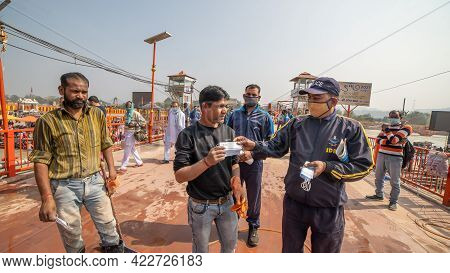 Haridwar, Uttarakhand India April 06, 2021. Policemen Spreading Awareness Of Protection From Coronav