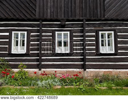 Borovnicka, Czech Republic - May 15, 2021. Detail Of Traditional Old Houses In Podkrkonosi Region