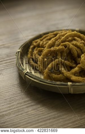 Murukku Is A Savory, Crunchy Snack Originating From The Indian Subcontinent.its An Indian Traditiona