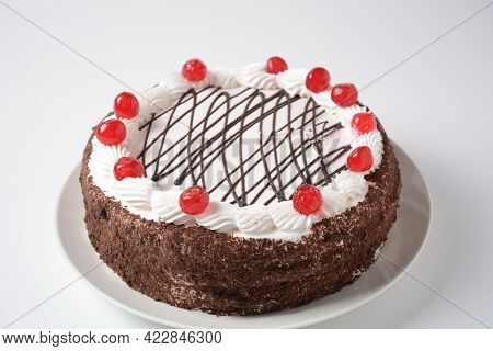 Black Forest Cake, Schwarzwald Pie, Dark Chocolate And Cherry Dessert On A White Background. Black F