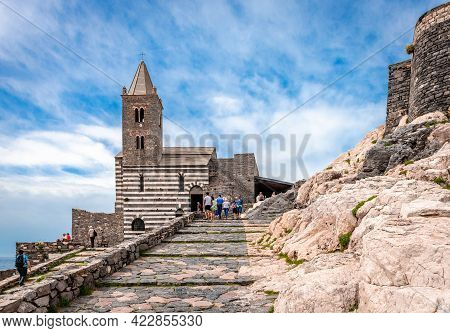 Porto Venere, Italy - May 28 2018: The Church Of St. Peter And The Square Spallanzani. The Roman Cat