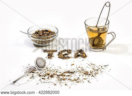 Tea Text Made By Tea Leaf On Wwhite Background Surface With A Bowl Of Tea And Small Glass Tea Cup