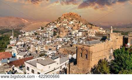 Savur, Mardin, Turkey - January 2020: Town Of Savur With Old Stone Houses On A Hill With Dramatic Sk