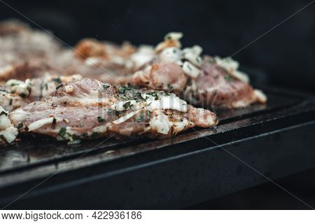 Wonderful Detail Of Grilling Pork Neck Meat On A Granite Stone Laid On The Heat Of The Fire. Meat Sp