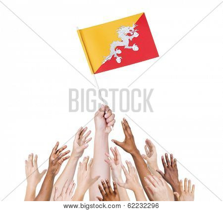 Diverse Multiethnic Hands Holding and Reaching For The Flag of Bhutan