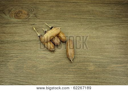Seed Of Thunbergia Laurifolia On Wood Background