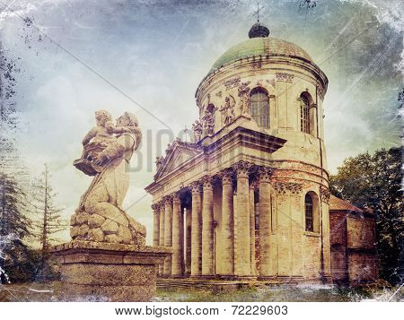 Statues And Roman Catholic Church Of The Exaltation Of The Holy And St. Joseph. Pidhirtsi Castle