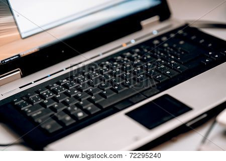 Laptop keabord with trackpoint and touchpad on white