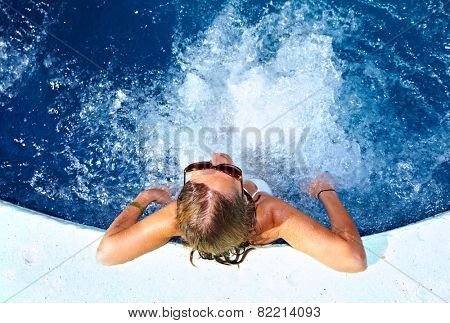 Beautiful girl relaxing in . Spa background