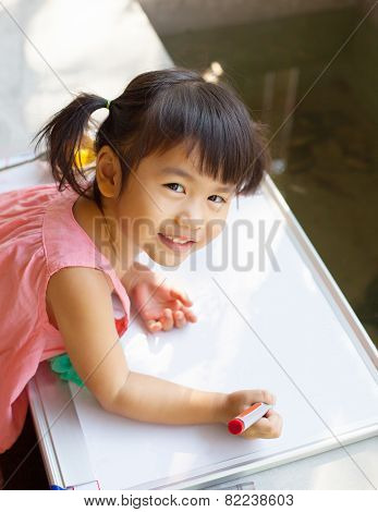 Lovely Kid Practice For Writing On White Broad Before Class Learning In Pre Kindergarten