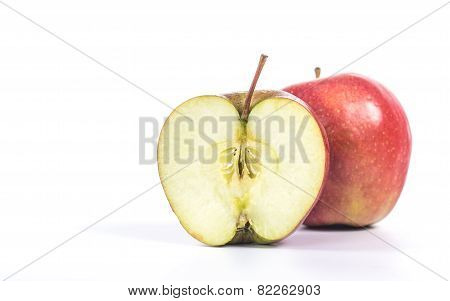 Red apple with one cuted on half