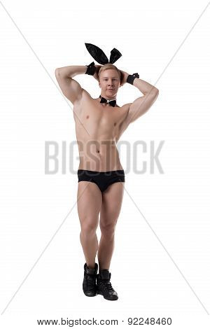 Image of strong macho posing in sexy bunny suit