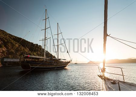 Traditional sail boat anchored in a bay of Skopea Limani, Turkey