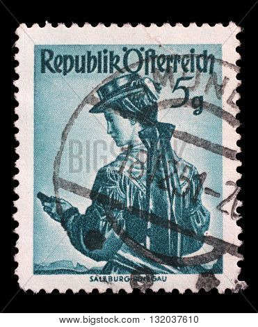 ZAGREB, CROATIA - SEPTEMBER 13: a stamp printed in the Austria shows Woman from Salzburg, Pinzgau, Regional Costume, circa 1949, on September 13, 2014, Zagreb, Croatia