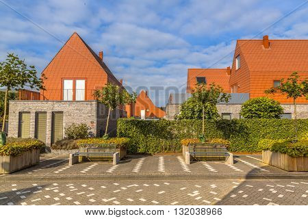 Modern Houses With Conspicious Red Slate Roof Tiles
