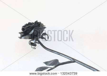 Forged metal products. Flowers and leaves are forged and coated with a primer. design elements. On a white background.