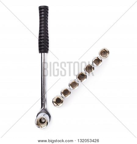 Wrench with line of metal sockets over white isolated background
