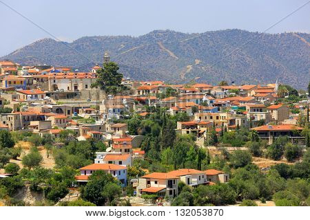 Red house roofs of Mediterranean village in Cyprus mountains