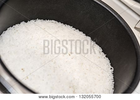 steamed rice in the inner pot of electric rice cooker