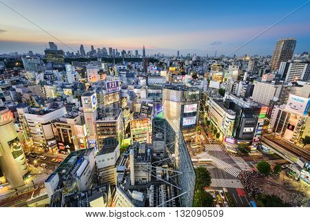 TOKYO, JAPAN - AUGUST 4, 2015: The Shibuya skyline at twilight. Shibuya is considered Tokyo's center for youth fashion and culture.