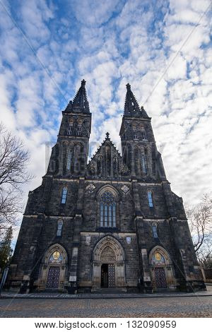 Medieval church in Prague, white clouds in the background