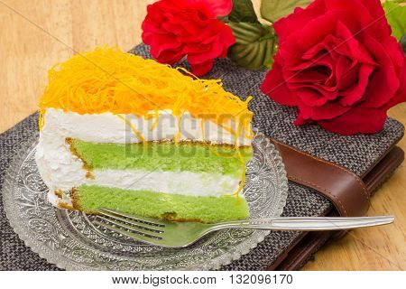 Piece of pandan cake with foi thong