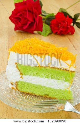 Piece of pandan cake with foi thong