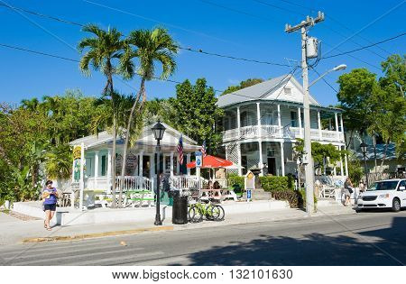 KEY WEST FLORIDA USA - MAY 01 2016: Typical Florida houses in Duval street in the center of Key West