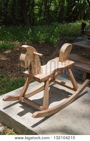 Children toy of wooden rocking horse stock photo