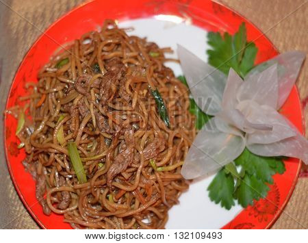 Chinese noodles. Chinese food plate with decoration