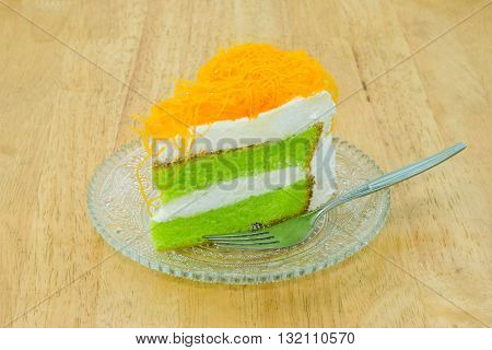 Piece of pandan cake with foi thong