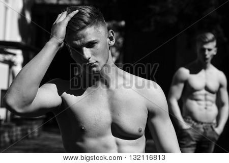 Undressed Man And Twin Brother