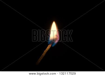Burning Match On A Black Background