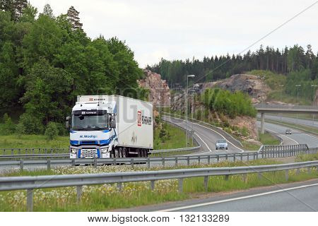 SALO, FINLAND - MAY 29, 2016: Renault Trucks T semi of H Modig Ky transports goods along Helsinki Turku motorway in South of Finland.