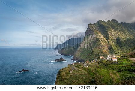 Madeira island north coast landscape. Steep rocks and mountains on the Atlantic ocean shore. Portugal.