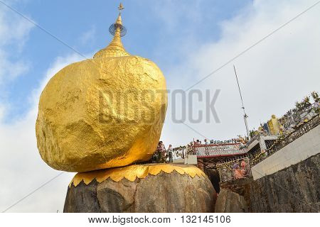 Kyaiktiyo, Mon state, Myanmar- April 24 2016: Buddhist prayers at Kyaiktiyo Pagoda (Golden Rock) One of the most Buddhist worshipful place in Myanmar.