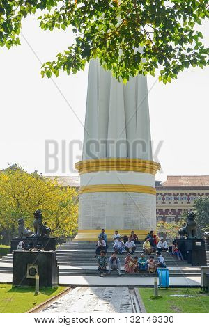 Yangon Myanmar - April 26 2016 : Burmese relaxing at Independence Monument in Mahabandoola park in downtown Yangon