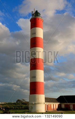 the  red and white lighthouse of Berck, France ,