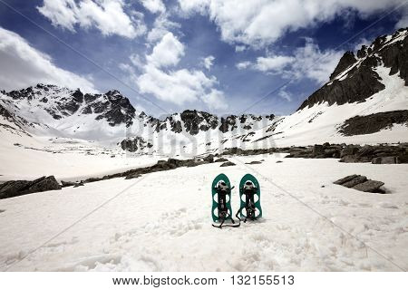 Snowshoes In Snowy Mountains