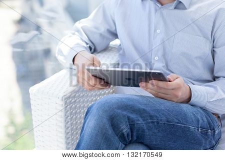 Alushta Russia - May 14 2016: Man holding in the hand a new iPad Pro Space Gray. iPad Pro was created and developed by the Apple inc.