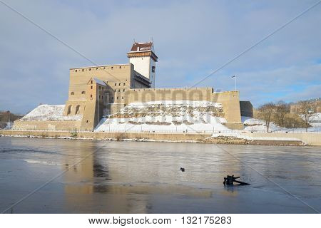 View of the castle Herman cloudy march morning. Narva, Estonia