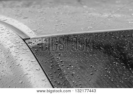 Close up water drops on car after raining