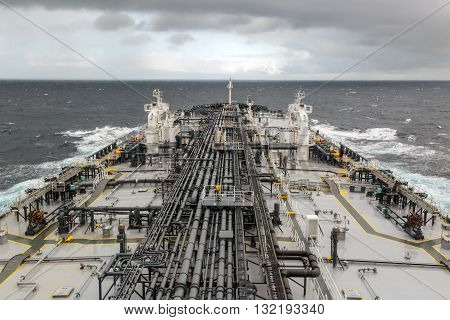 Airview of the oil tanker deck in the open sea.
