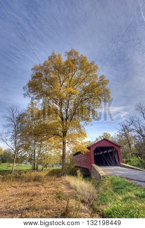 Covered bridge in Utica Mills Maryland in Autumn