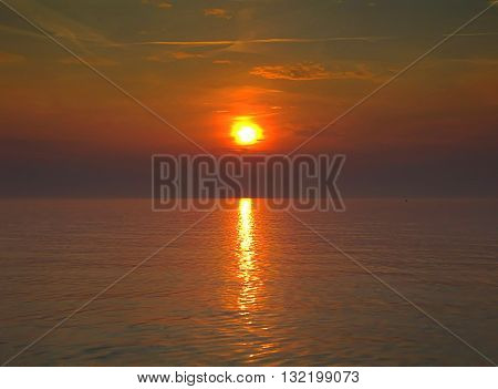 sunset by sailing, sun like fire ball