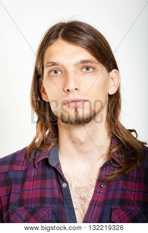 Masculinity concept. Man in plaid shirt. Young male posing on white background.