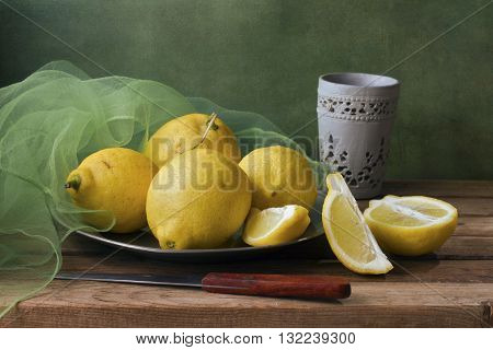 Still life with lemons and green gauze