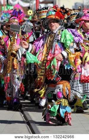 GALVESTON, TEXAS/USA - February 7 2016: 12th Annual Firefighter's Children's Parade in Galveston, Texas features the Quaker City String Band Philadelphia Mummers.  The colorfully costumed band members opened this family friendly event.